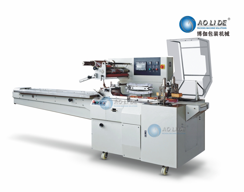BG-450W往復(fù)式上走膜枕式包裝機(jī).jpg BG-450W往復(fù)式上走膜枕式包裝機(jī).jpg